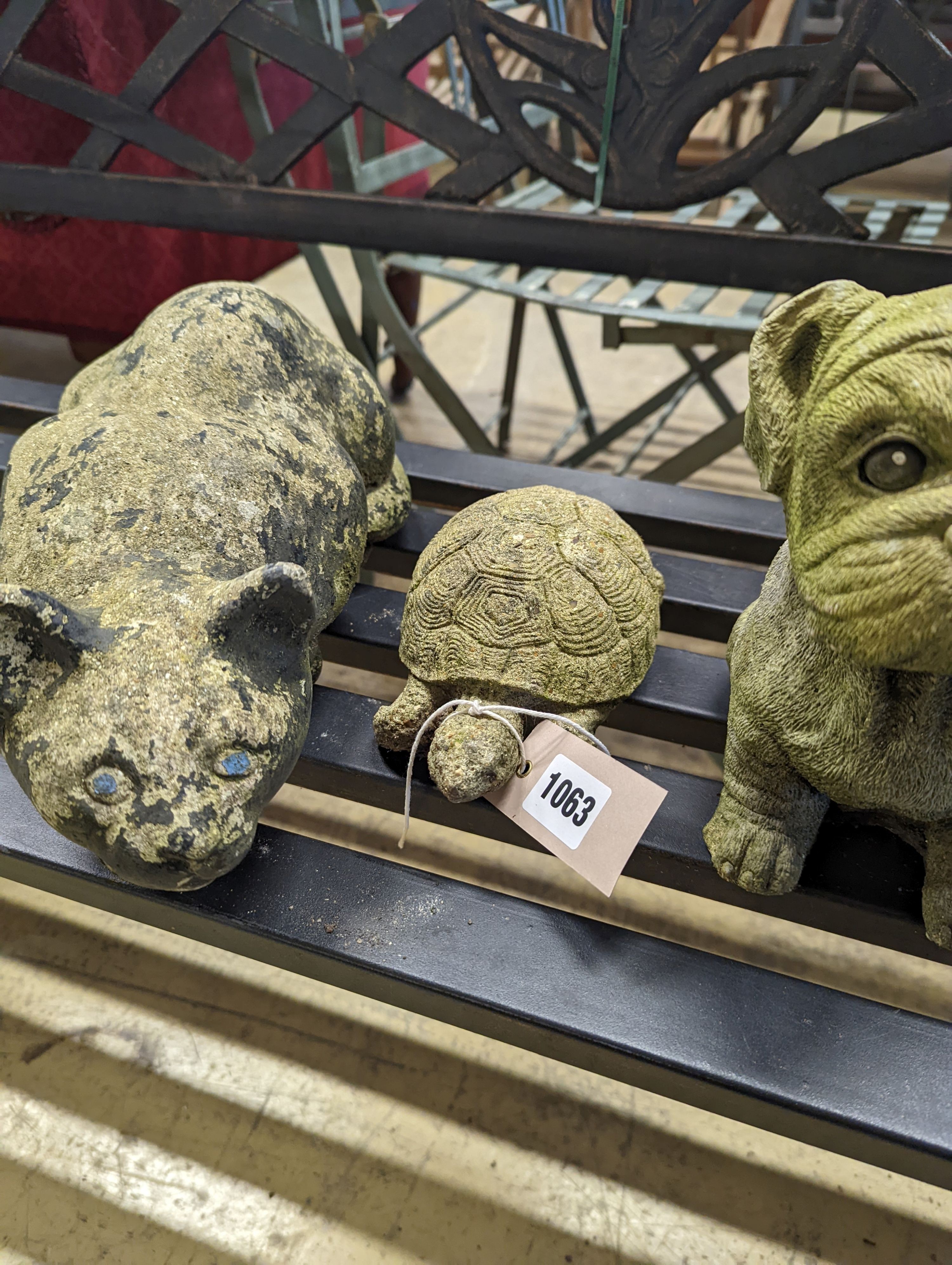 Four reconstituted stone animal garden ornaments, largest length 35cm